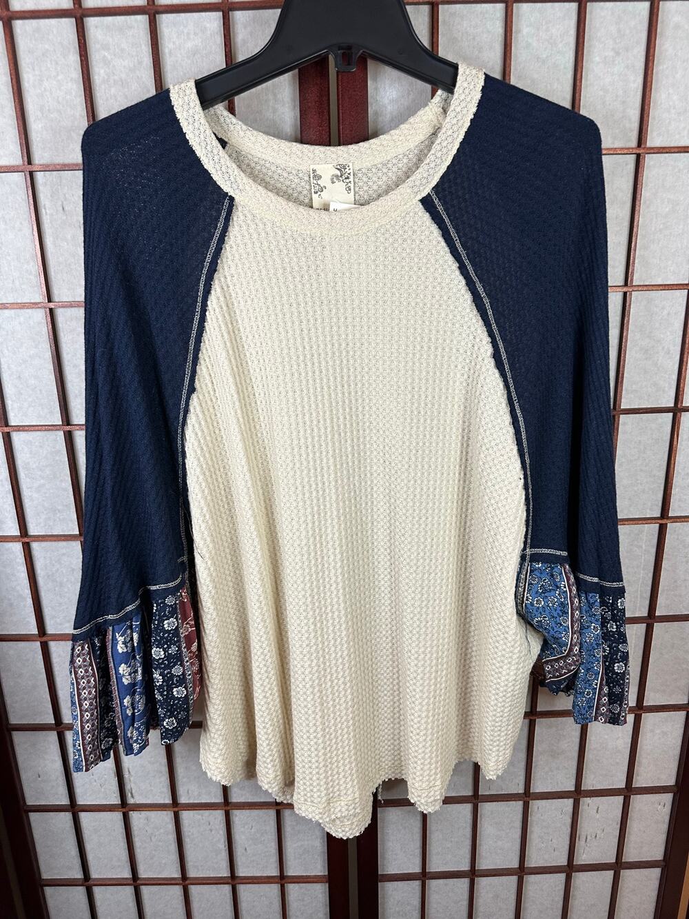 Blu Pepper long-sleeve, v-neck waffle knit top with dark blue raglan sleeves